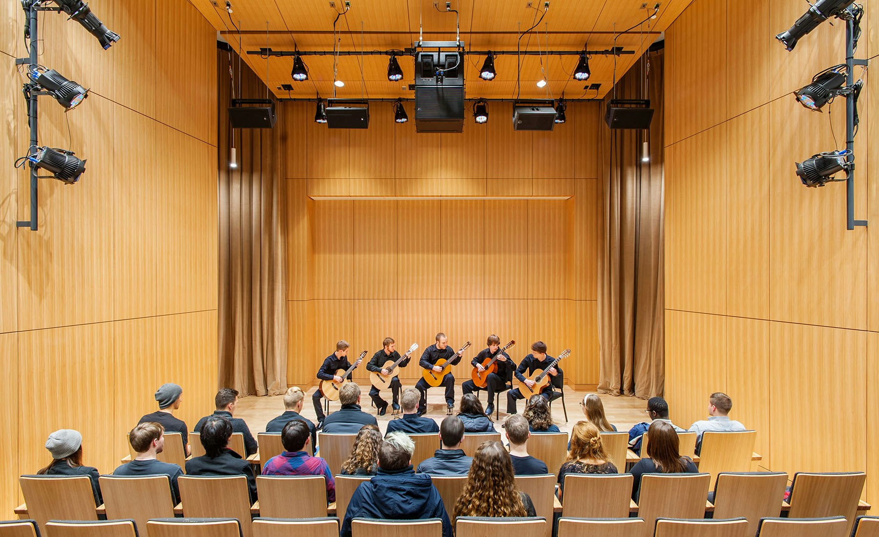 Students and instructors from a wide range of undergraduate and graduate degree programs meet and collaborate in a range of learning spaces, including: individual practice modules, small group practice rooms, teaching studios, commons rooms, traditional classrooms, and choral, percussion, and band practice rooms – each painstakingly designed to produce the perfect physical space for musical performance.